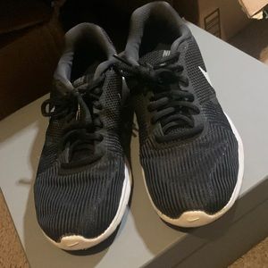 Black and white Nike. Worn twice
